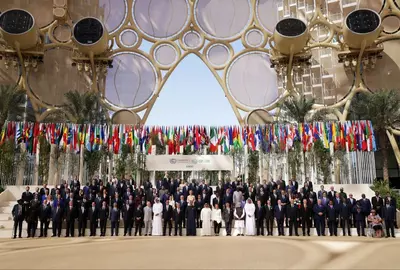 Delegatieleden van COP28-klimaattop, Dubai, 2023.